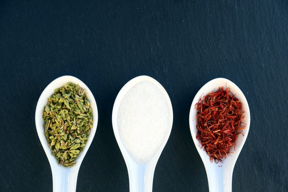 three different spices in tablespoons