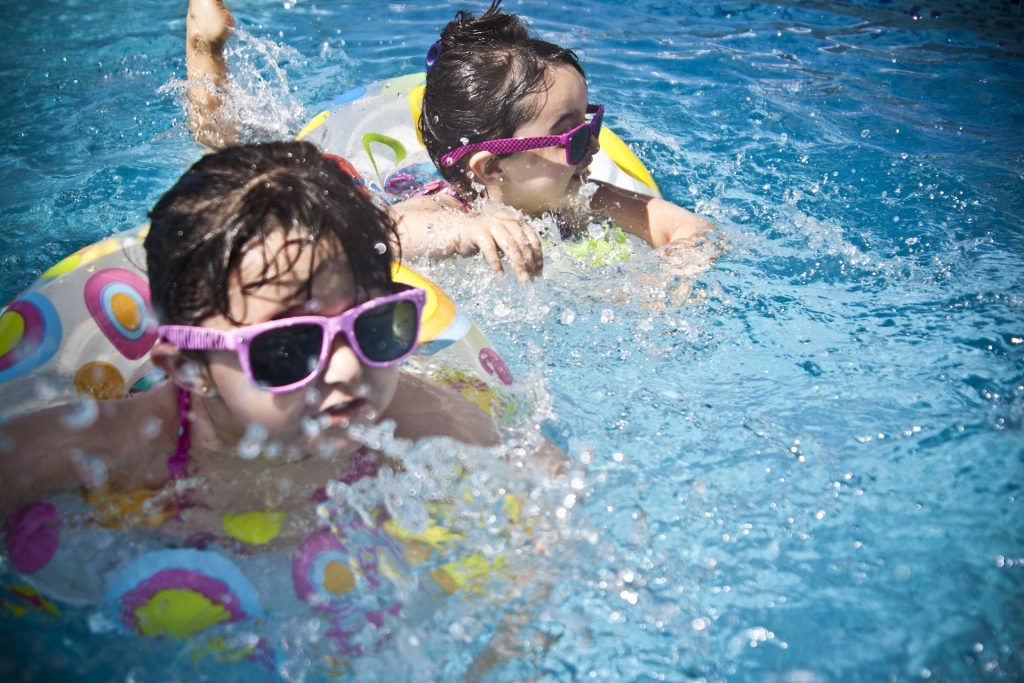 kids swimming in the pool